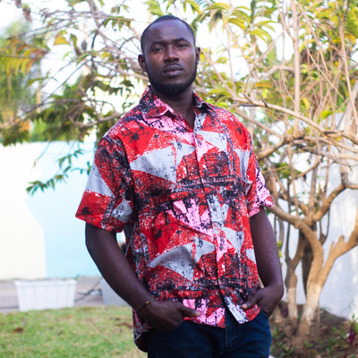 Men's cotton shirt, 'Orange Splash' - Men's Printed Cotton Short Sleeve Shirt from Ghana