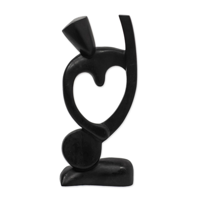 Holzskulptur - Kunsthandwerklich gefertigte Herz-Skulptur aus Sese-Holz