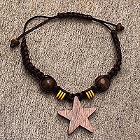 Ebony wood charm bracelet, 'Star-Crossed' - Hand Made Ebony Wood Star-Motif Charm Bracelet