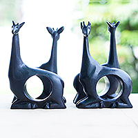 Wood napkin rings, 'Giraffe Feast' (set of 4) - Hand-Carved 4-Piece Black Teak Wood Giraffe Napkin Ring Set