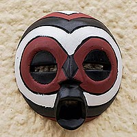 Afrikanische Holzmaske, „Dagomba Festival“ – Runde Wandmaske aus Sese-Holz aus Ghana