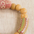 Eco-friendly beaded stretch bracelet, 'Flowery Kingdom' - Handcrafted Eco-Friendly Beaded Bracelet