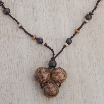 Beaded pendant necklace, 'Third Party' - Sese Wood Beaded Pendant Necklace from Ghana