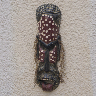 Afrikanische Holzmaske - Handgefertigte traditionelle afrikanische Holzmaske mit Sprenkeln