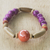 Eco-friendly beaded bracelet, 'Strong Heart' - Eco-Friendly Purple Beaded Bracelet from Ghana