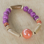 Eco-friendly beaded bracelet, 'Strong Heart' - Eco-Friendly Purple Beaded Bracelet from Ghana