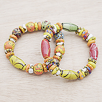 Glass beaded stretch bracelets, 'Maize Maidens' (Pair) - Maize Recycled Glass Beaded Stretch Bracelets (Pair)