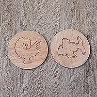 Wood coasters, 'Sea Sankofa' (set of 2) - Set of 2 Hand-Carved Sese Wood Fish and Bird Coasters