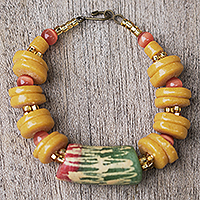 Glass beaded pendant bracelet, 'Oyerepa' - Handcrafted Orange Glass Beaded Pendant Bracelet from Ghana