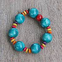 Recycled plastic and wood beaded stretch bracelet, 'Waves of Happiness' - Colorful Eco-Friendly Beaded Stretch Bracelet from Ghana