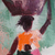 'El tiempo es dinero' - Pintura impresionista ghanesa de acrílico sobre lienzo de una mujer