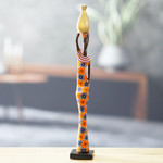 Ebony wood sculpture, 'Colorful Lady' - Ebony Wood Sculpture of Woman with Pot Hand-Carved in Ghana