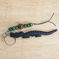 Wood key chain, 'Reptile Amulet' - Handcrafted Ebony Wood Crocodile Key Chain from Ghana