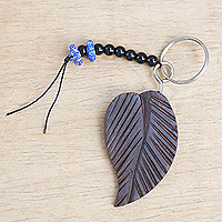Recycled glass beaded ebony wood keychain, 'Cute Leaf' - Handmade Ebony Leaf Keychain with Recycled Glass Beads
