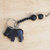 Beaded ebony wood keychain, 'Lion' - Eco-Friendly Ebony Lion Keychain with Wood Beads