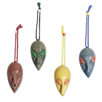 Wood ornaments, 'Asomdwe Nsem' (set of 4) - Set of 4 African Mask Ornaments Handcrafted from Ofram Wood