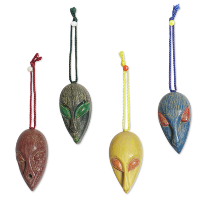 Wood ornaments, 'Asomdwe Nsem' (set of 4) - Set of 4 African Mask Ornaments Handcrafted from Ofram Wood