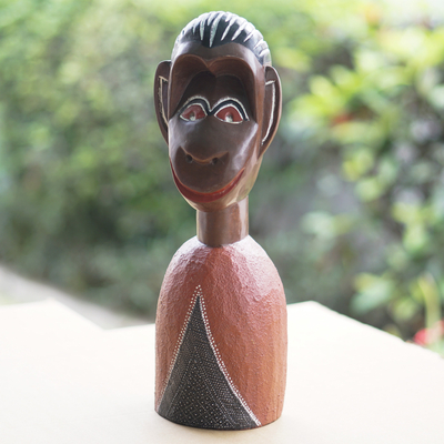 Escultura de madera - Escultura artesanal de madera de sesé de un mono en tonos cálidos