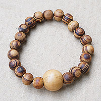 Wood beaded stretch bracelet, 'Wooden Universe' - Handcrafted Sese Wood Beaded Stretch Bracelet from Ghana
