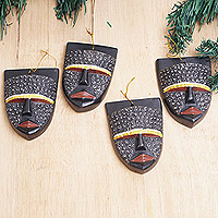 Aluminum-accented wood ornaments, 'Metallic Glances' (set of 4) - Set of 4 Aluminum-Accented Sese Wood African Mask Ornaments