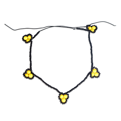 Recycled glass beaded anklet, 'Yellow Emotions' - Eco-Friendly Yellow and Black Glass Beaded Anklet from Ghana