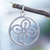 Sterling silver pendant, 'Abundance Core' - Sterling Silver Round Pendant with Flower Icon from Ghana