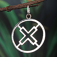 Sterling silver pendant, 'Authority Core' - Sterling Silver Round Pendant with Cross Icon from Ghana