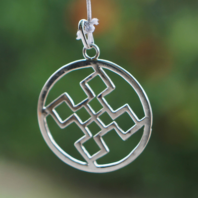 Sterling silver pendant, 'Authentic Core' - Sterling Silver Round Pendant with Geometric Icon from Ghana
