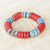 Recycled glass beaded stretch bracelet, 'Audacious Waves' - Recycled Glass Beaded Stretch Bracelet in Blue and Red