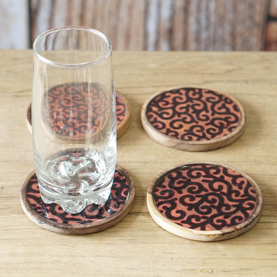 Wood coasters, 'Fire Ivy' (set of 4) - Set of 4 Ivy-Patterned Black and Orange Neem Wood Coasters