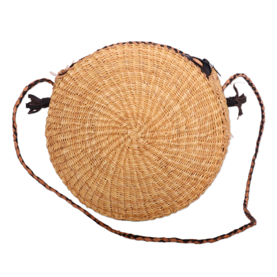 Leather-accented raffia sling bag, 'Jungle Core' - Handwoven Leather-Accented Round Raffia Sling Bag
