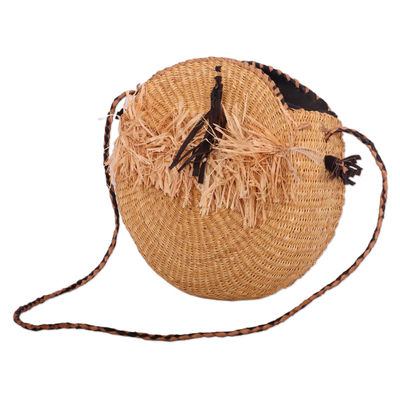 Leather-accented raffia sling bag, 'Jungle Core' - Handwoven Leather-Accented Round Raffia Sling Bag