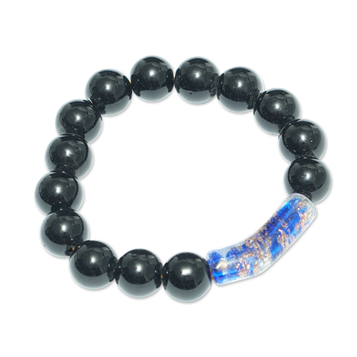 Recycled glass beaded pendant bracelet, 'Blue Okatakyei' - Black and Blue Recycled Glass Beaded Pendant Bracelet