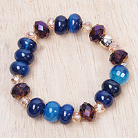 Recycled glass beaded stretch bracelet, 'Blue Caresses' - Eco-Friendly Blue Recycled Glass Beaded Stretch Bracelet