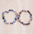 Recycled glass beaded stretch bracelets, 'Unique Shades' (pair) - Eco-Friendly Glass Beaded Stretch Bracelet Pair from Ghana