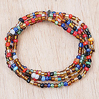 Recycled glass beaded stretch bracelets, 'The Celebrity' (set of 4) - Set of 4 Colorful Recycled Glass Beaded Stretch Bracelets
