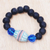 Recycled glass beaded stretch bracelet, 'Electric Soul' - Blue and Black Recycled Glass Beaded Stretch Bracelet
