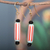 Recycled glass beaded dangle earrings, 'Red Route' - Eco-Friendly Striped Red and White Beaded Dangle Earrings