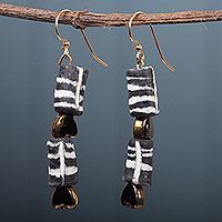 Recycled glass beaded dangle earrings, 'Trust in Love' - Heart-Themed Golden and Black Glass Beaded Dangle Earrings