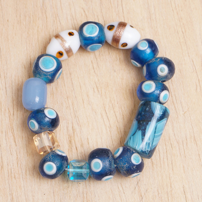 Recycled glass beaded stretch bracelet, 'Dreams & Love' - Eco-Friendly Blue and White Glass Beaded Stretch Bracelet