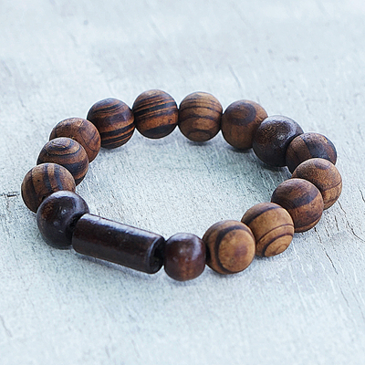 Wood beaded stretch bracelet, 'My Forest Friend' - Handcrafted Sese Wood Beaded Stretch Bracelet from Ghana