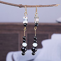 Recycled plastic and glass beaded dangle earrings, 'Luxurious Illusion' - Black and White Plastic and Glass Beaded Dangle Earrings