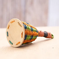 Rattan caxixi shaker, 'Tropical Twist' - Handcrafted Orange and Green Rattan Fiber Caxixi Shaker