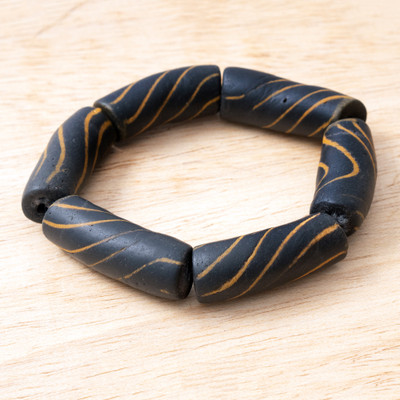 Recycled glass beaded stretch bracelet, 'Golden Fate' - Black and Yellow Unisex Recycled Glass Bead Stretch Bracelet