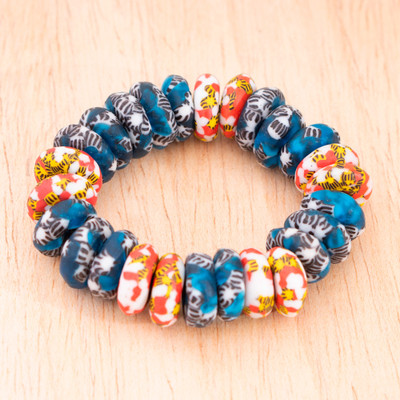 Recycled glass beaded stretch bracelet, 'Spring Nights' - Classic Blue and Red Recycled Glass Beaded Stretch Bracelet