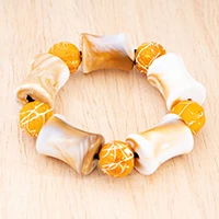 Recycled glass beaded stretch bracelet, 'Sunny Triumph' - Summer-Inspired Yellow and Ivory Beaded Stretch Bracelet