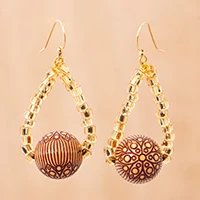 Wood dangle earrings, 'Seeds of Triumph' - Golden and Brown Sese Wood Dangle Earrings Made in Ghana