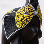 Wood and recycled glass beaded figurine, 'Trunk Held High' - Elephant with Raised Trunk-Themed Wood Glass Beaded Figurine
