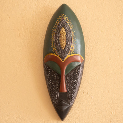 Brass and aluminum embossed African wood wall mask, 'Face of Favor II' - Elongated Wood and Embossed Brass Aluminum African Wall Mask