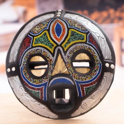 African beaded wood wall mask, 'Pendo Shanga' - Recycled Glass Beaded Wood Aluminum Round African Wall Mask